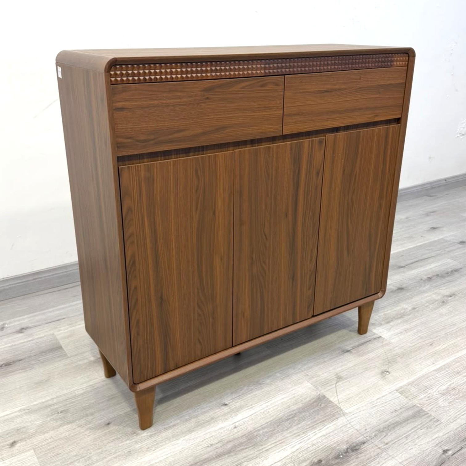 Amara wooden storage cabinet with five doors, two upper drawers and raised legs
