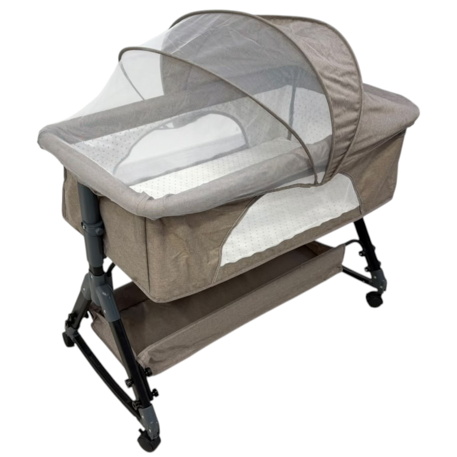 Baby bassinet with mosquito net, padded sides, storage shelf and caster wheels